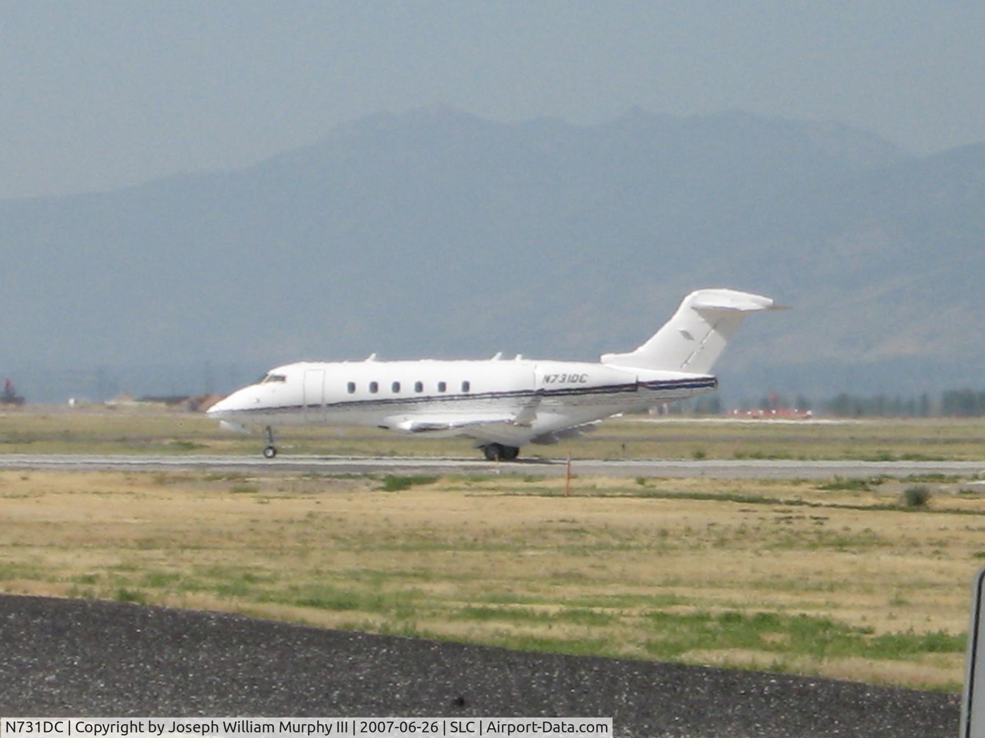 N731DC, 2005 Bombardier Challenger 300 (BD-100-1A10) C/N 20073, Taxiing to Runway from General Aviation... (Runway 34R)