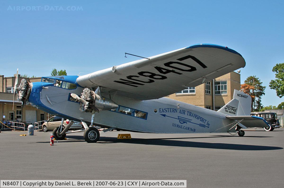 N8407, 1929 Ford 4-AT-E Tri-Motor C/N 69, EAA's lovely Ford Tri-Motor, one of three flying examples in existence, awaits another lucky group of passengers at Capital City Airport, Harrisburg, PA.