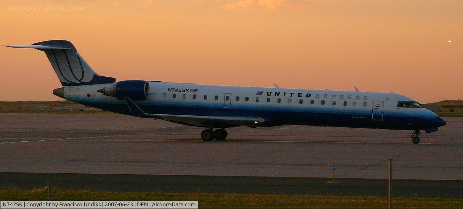N742SK, 2005 Bombardier CRJ-701 (CL-600-2C10) Regional Jet C/N 10197, Taxiing on Bravo November eastbound
