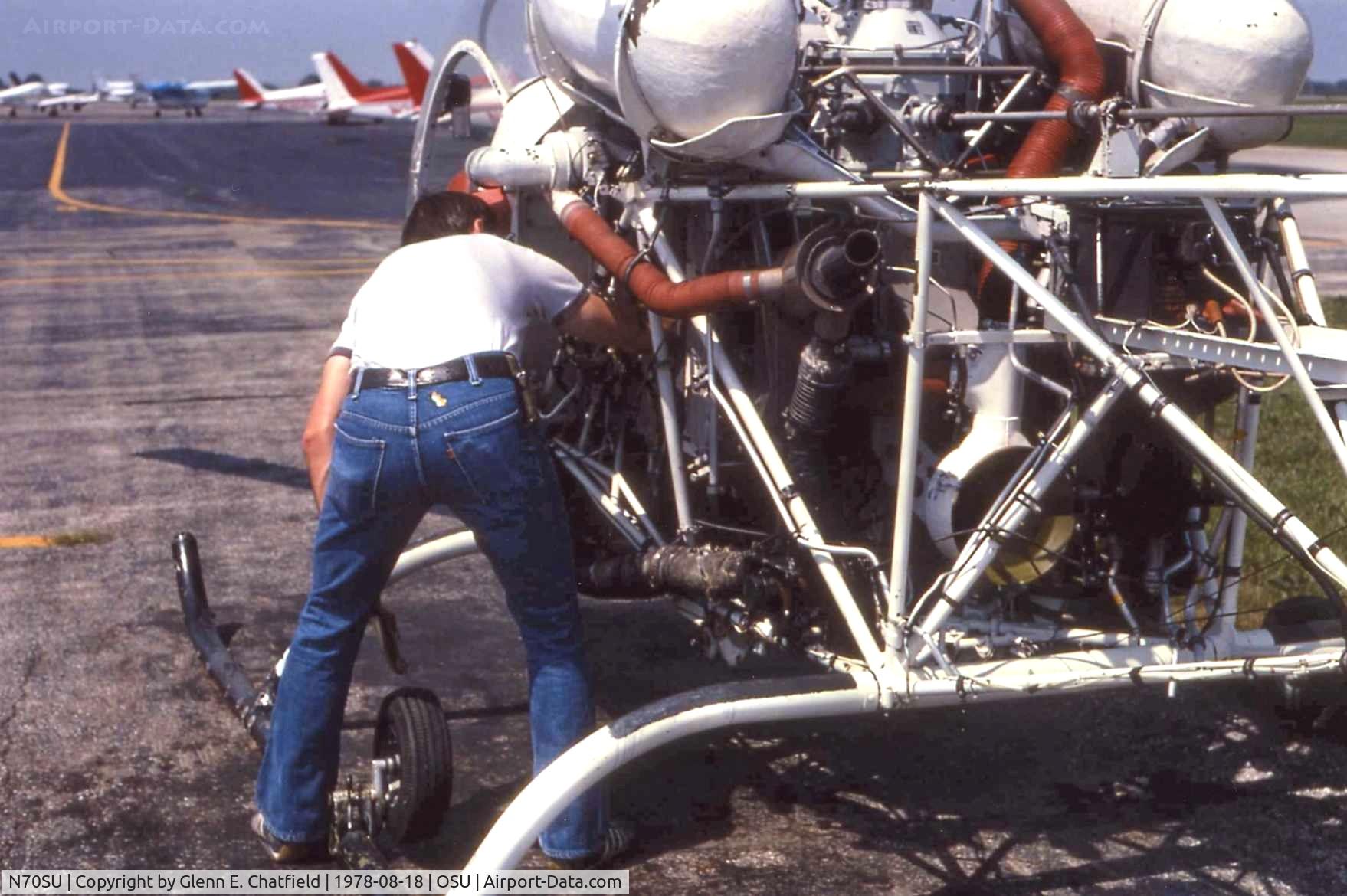 N70SU, 1959 Bell 47G-2 C/N 2511, Bell OH-13F 59-4928 with the Ohio State University Flight Department.  That's me preflighting to take my wife up over Columbus