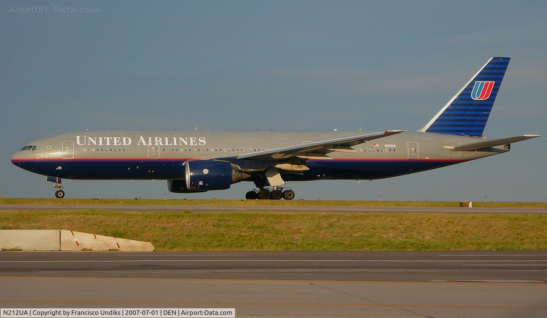 N212UA, 2000 Boeing 777-222 C/N 30218, On Taxiway Mike to Runway.