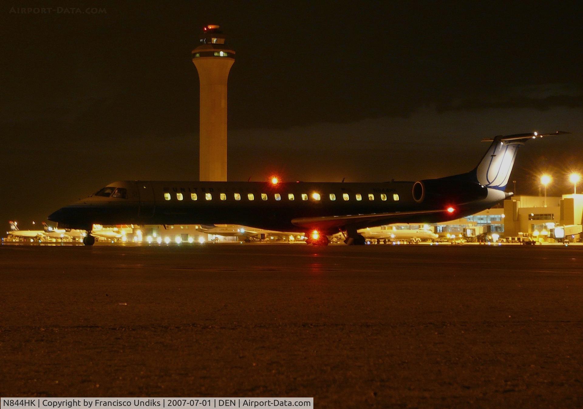 N844HK, 2004 Embraer ERJ-145LR (EMB-145LR) C/N 14500838, Waiting for clearance for taxi.