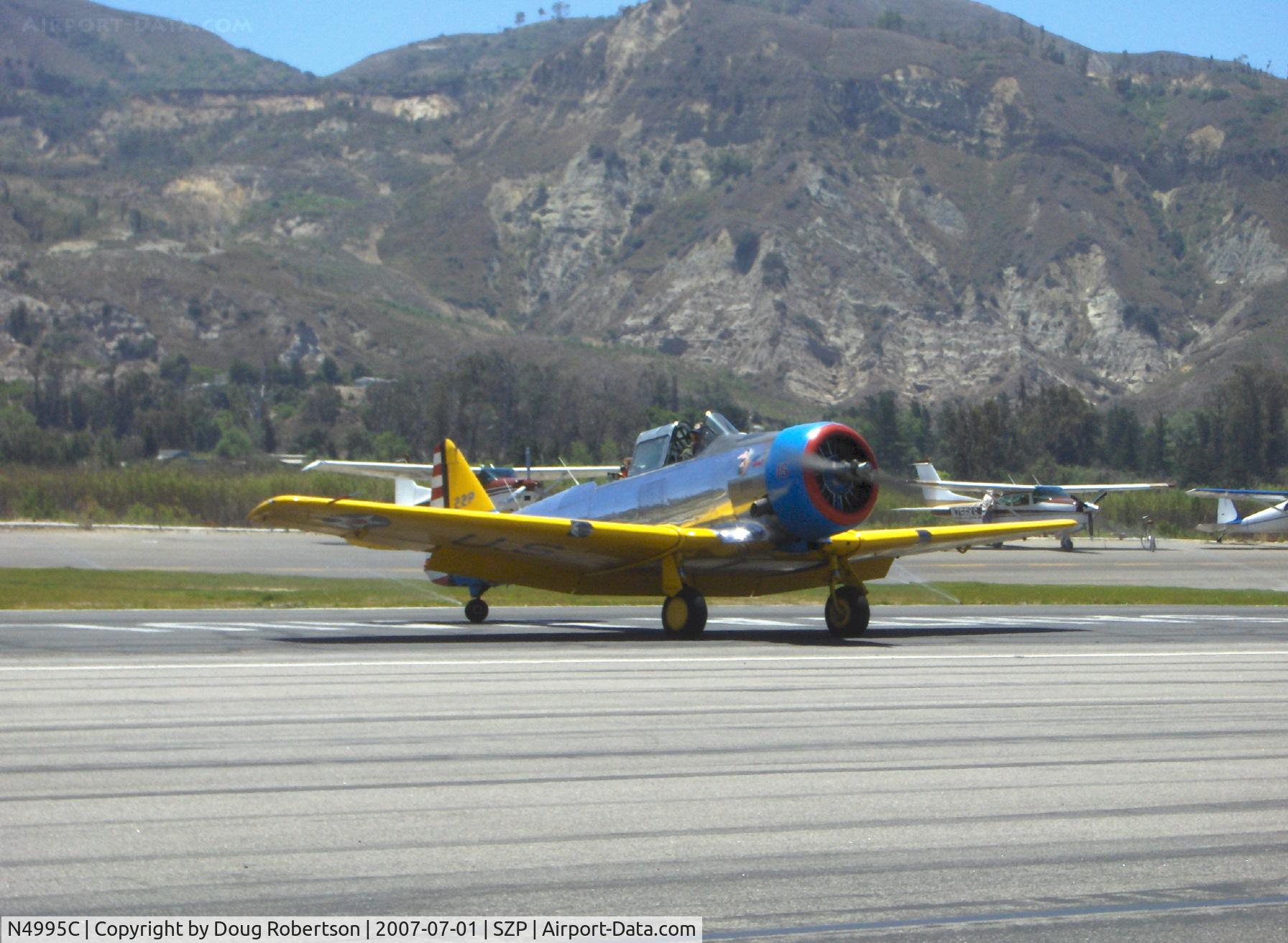 N4995C, 1949 North American T-6G Texan C/N 168-481, 1949 North American T-6G TEXAN 'Thirsty Girl', P&W R-1340 600 Hp, taxi turn off Rwy 22