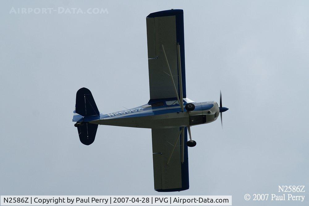 N2586Z, 1977 Bellanca 8KCAB Decathlon C/N 355-77, Easing along over Hampton Roads Exec Airport