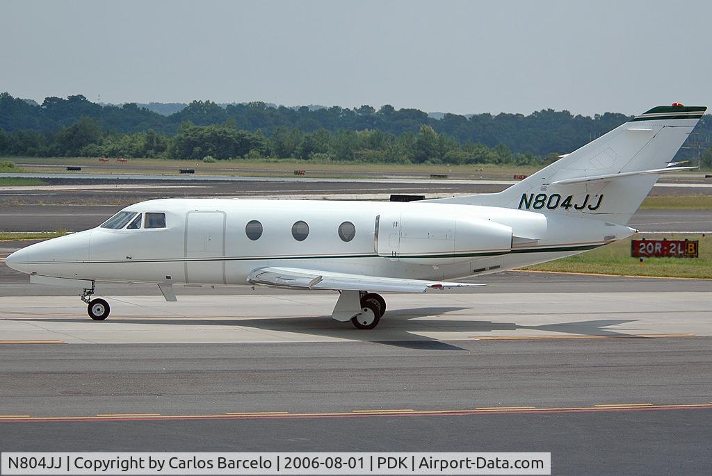 N804JJ, 1977 Dassault-breguet Falcon 10 C/N 105, Passing by the observation deck at PDK.