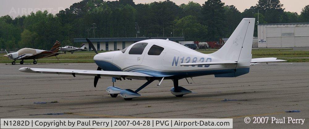N1282D, 2006 Columbia Aircraft Mfg LC41-550FG C/N 41642, The show was breaking up, and looked like rain.  So the doors are closed
