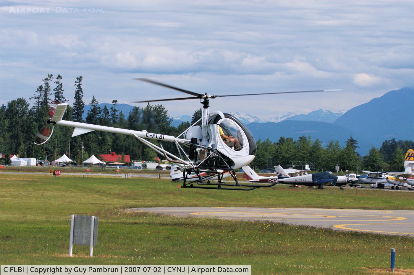 C-FLBI, 2006 Schweizer 269C-1 C/N 0264, Side view.  Isn't that the cutest thing you ever did see