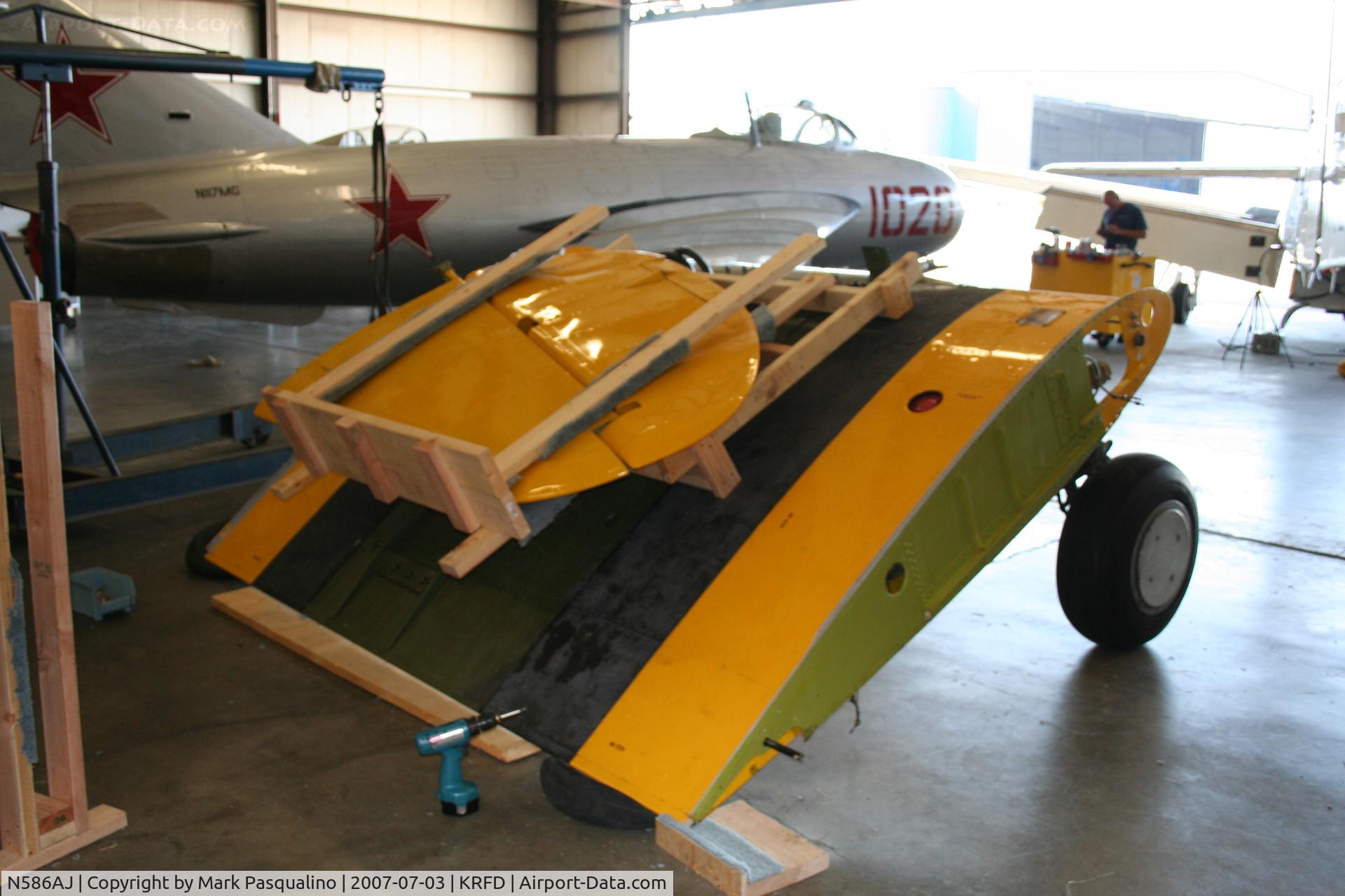N586AJ, North American AT-6 C/N AJ586, Aircraft to be placed into container. Going to Germany.