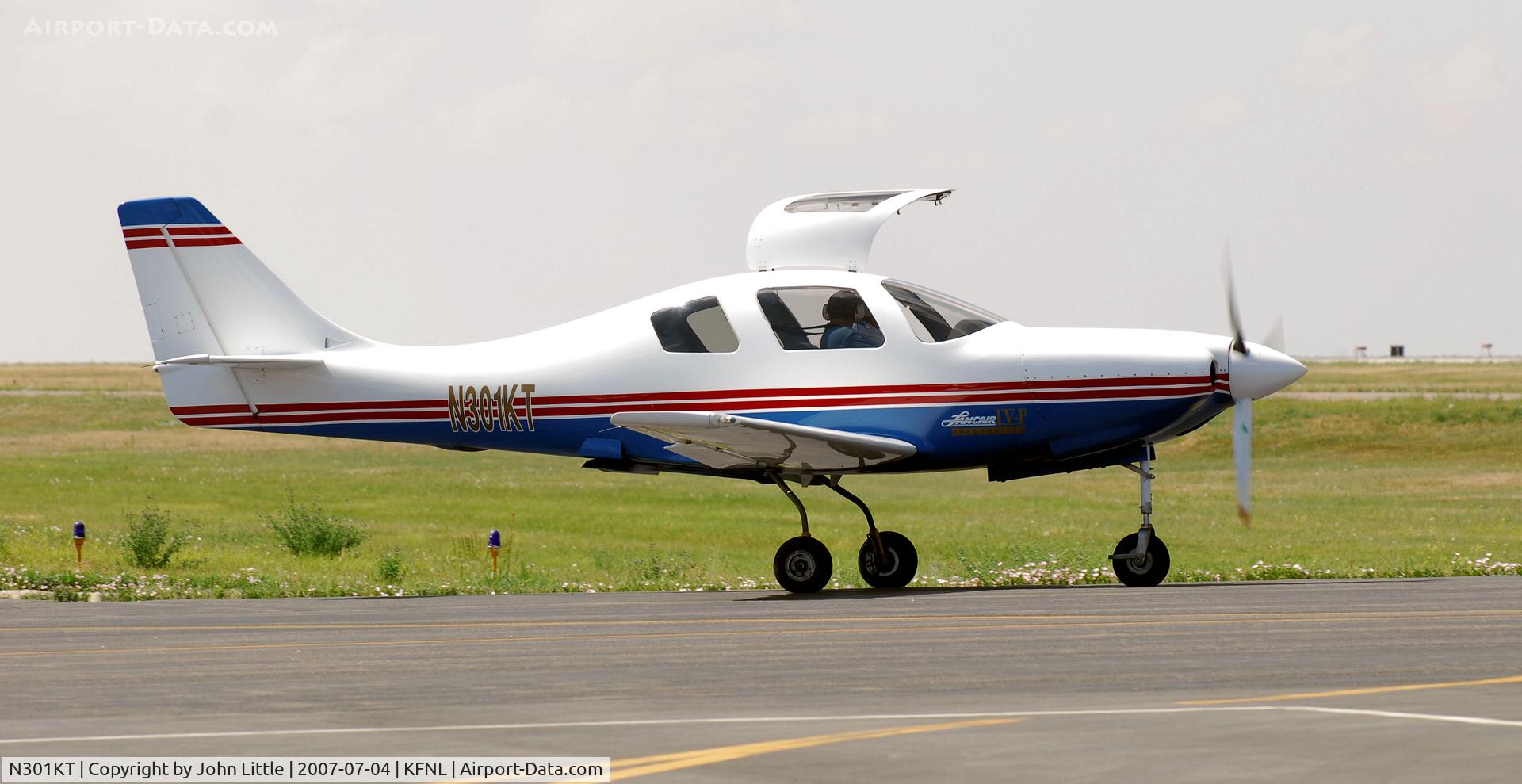 N301KT, 1994 Lancair IV C/N 043, Good Looking Lancair taxi to take-off Ft Collins/Loveland Airport