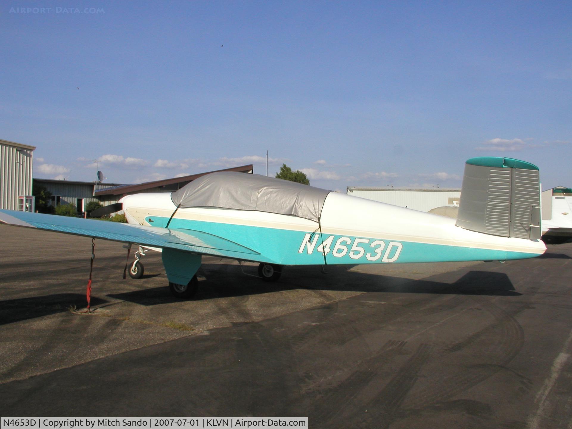 N4653D, 1956 Beech G35 Bonanza C/N D-4852, V-Tail parked on the ramp at Airlake.