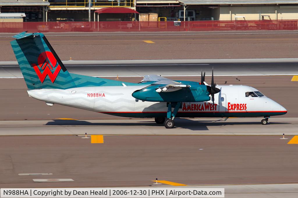N988HA, 1996 De Havilland Canada DHC-8-202 Dash 8 C/N 426, America West Express (Mesa Airlines) N988HA (FLT ASH2994) from Telluride Regional Airport (KTEX) taxiing to the gate after arrival.