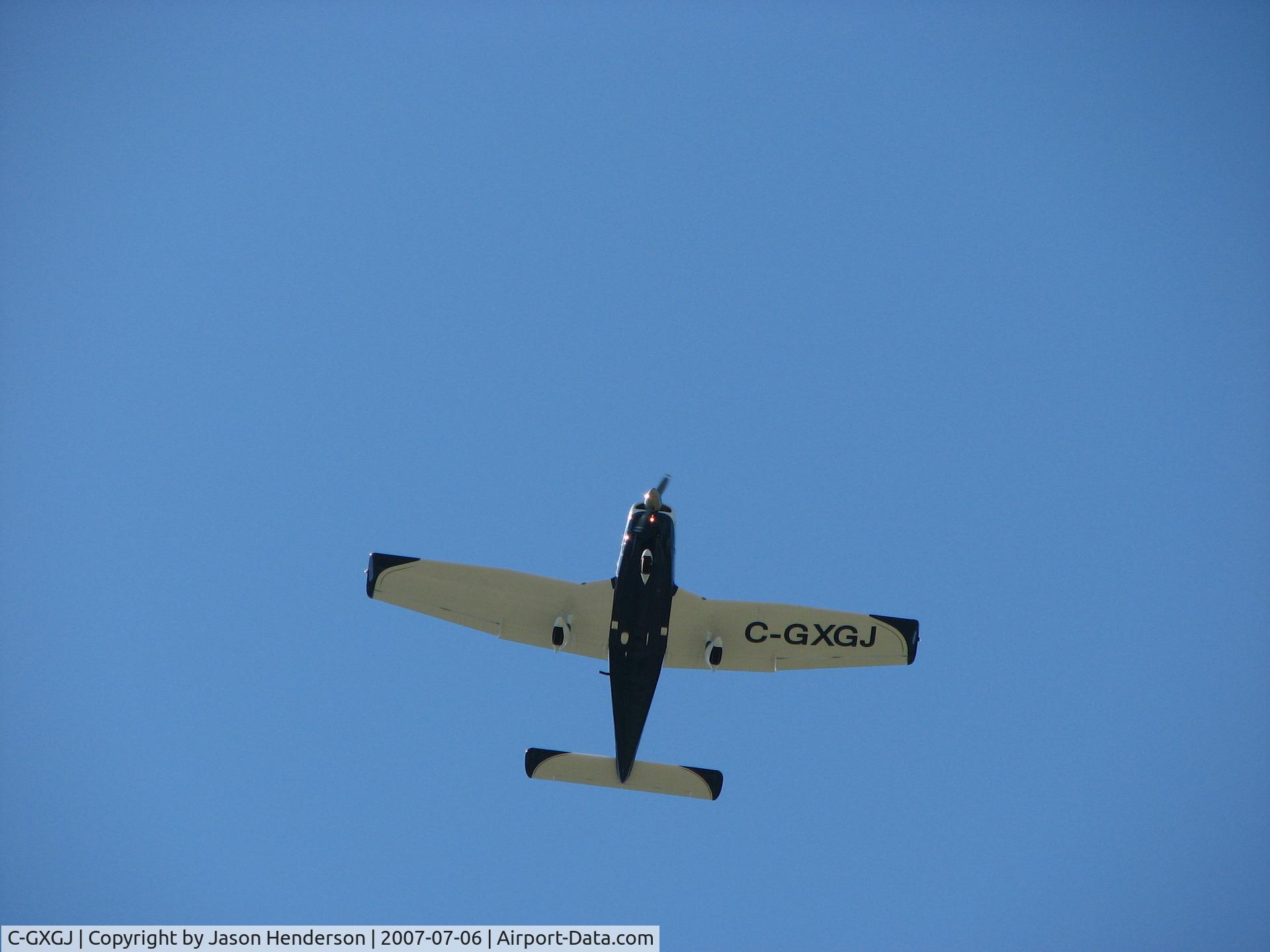 C-GXGJ, 1976 Piper PA-28-181 C/N 28-7690355, C-GXGJ Flying overhead on approach to Vernon Airport