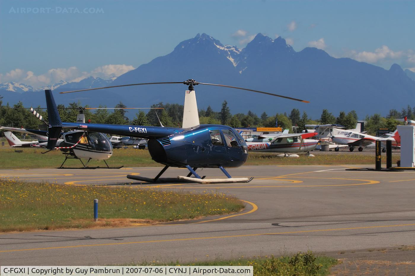 C-FGXI, 2000 Robinson R44 C/N 0768, Parked on the fuel ramp