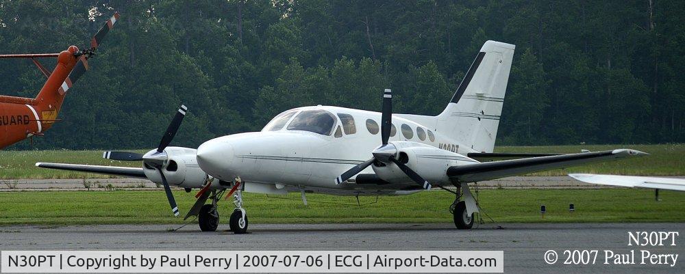 N30PT, 1976 Cessna 421C Golden Eagle C/N 421C0157, A Golden Eagle, sitting next to a touch of history