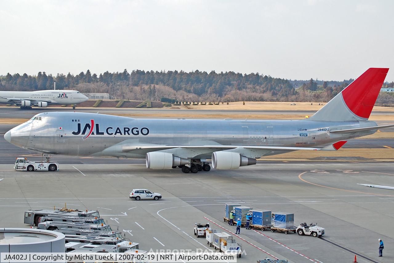 JA402J, 2004 Boeing 747-446F C/N 33749, Being towed to the parking position