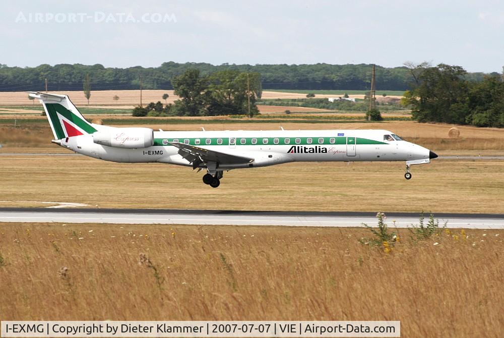 I-EXMG, 2002 Embraer ERJ-145LR (EMB-145LR) C/N 145652, Alitalia Express Embraer 145LR moments before touch down RWY 34