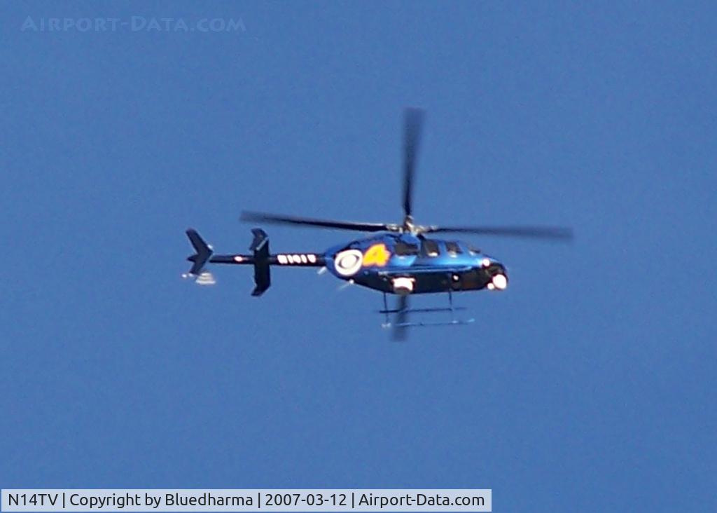 N14TV, 1996 Bell 407 C/N 53048, Denver Channel 4 News over Columbine High School.