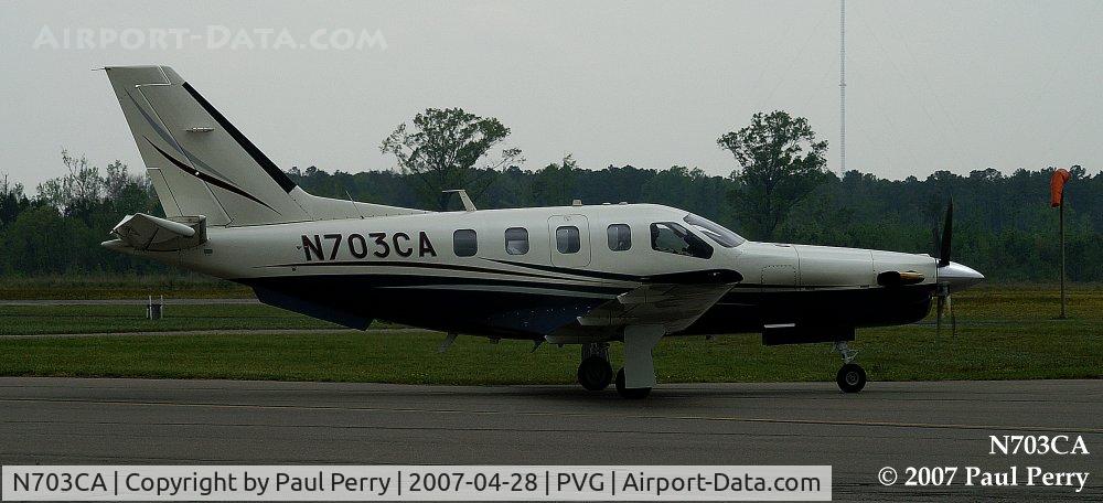 N703CA, 2003 Socata TBM-700 C/N 273, Taxiing past, you can see the long nose on her