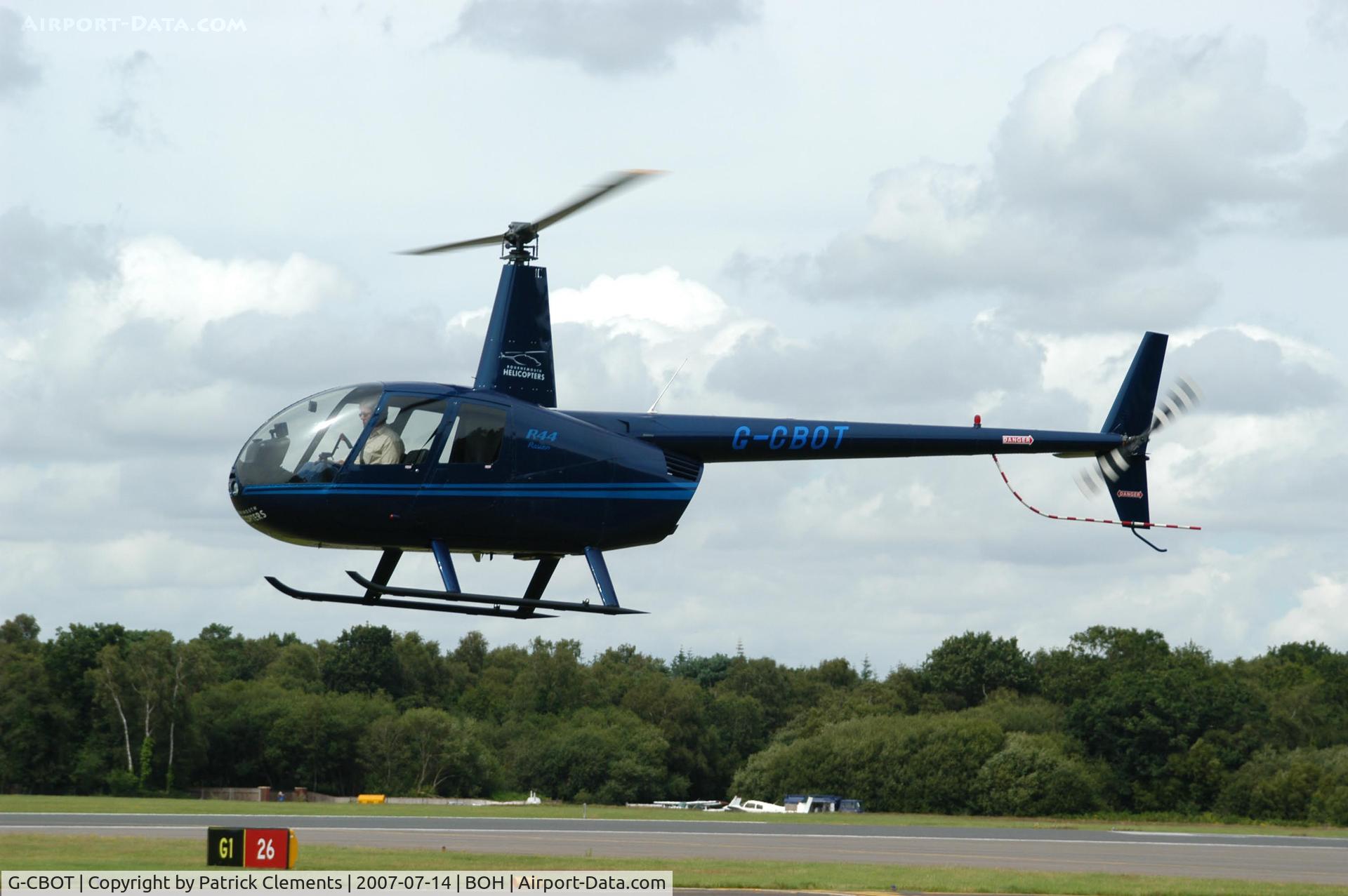 G-CBOT, 2002 Robinson R44 Raven C/N 1194, BOH HELICOPTER COMING IN TO LAND