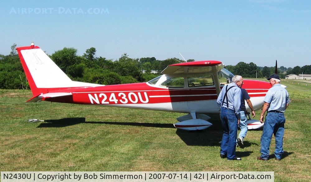 N2430U, 1963 Cessna 172D C/N 17250030, That's my dad (L), who owned this plane in the 70's and Forrest Garey (R), the current owner.  This is the first time Dad & I have seen this plane in 30 years.  Breakfast/Lunch fly-in at Zanesville, OH.