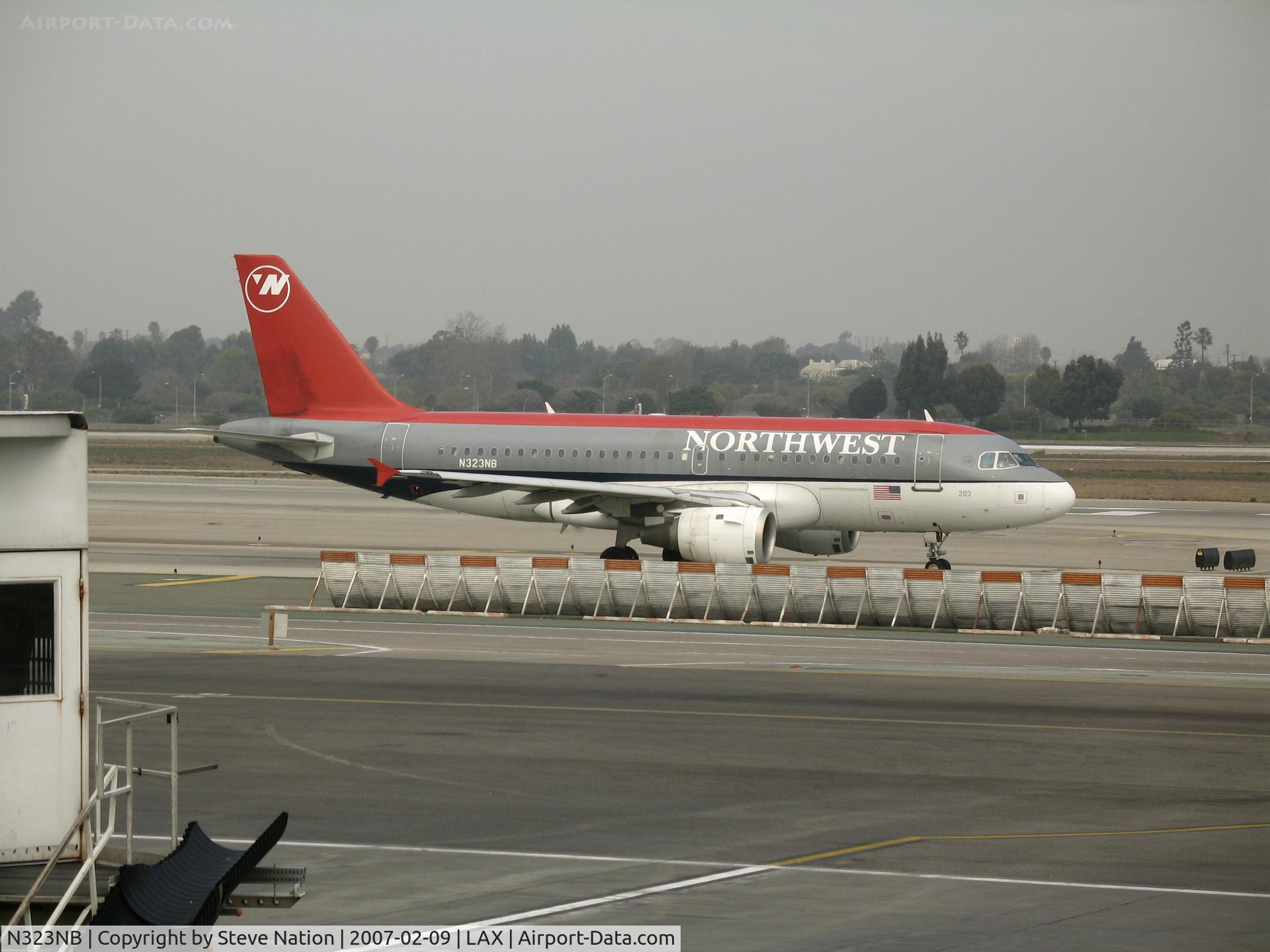 N323NB, 2001 Airbus A319-114 C/N 1453, Northwest A319-114 taxying @ LAX