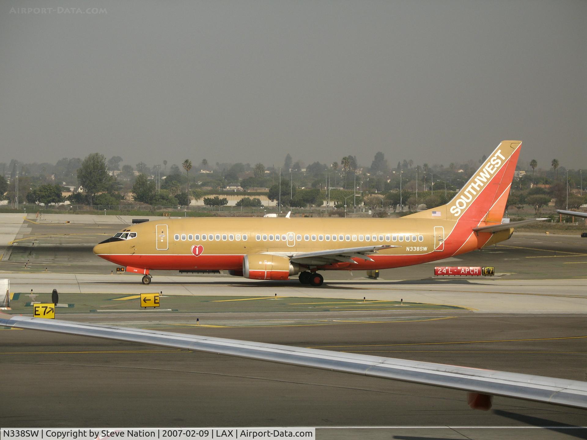N338SW, 1988 Boeing 737-3H4 C/N 23960, Southwest 737-3H4 in old colors taxying @ LAX