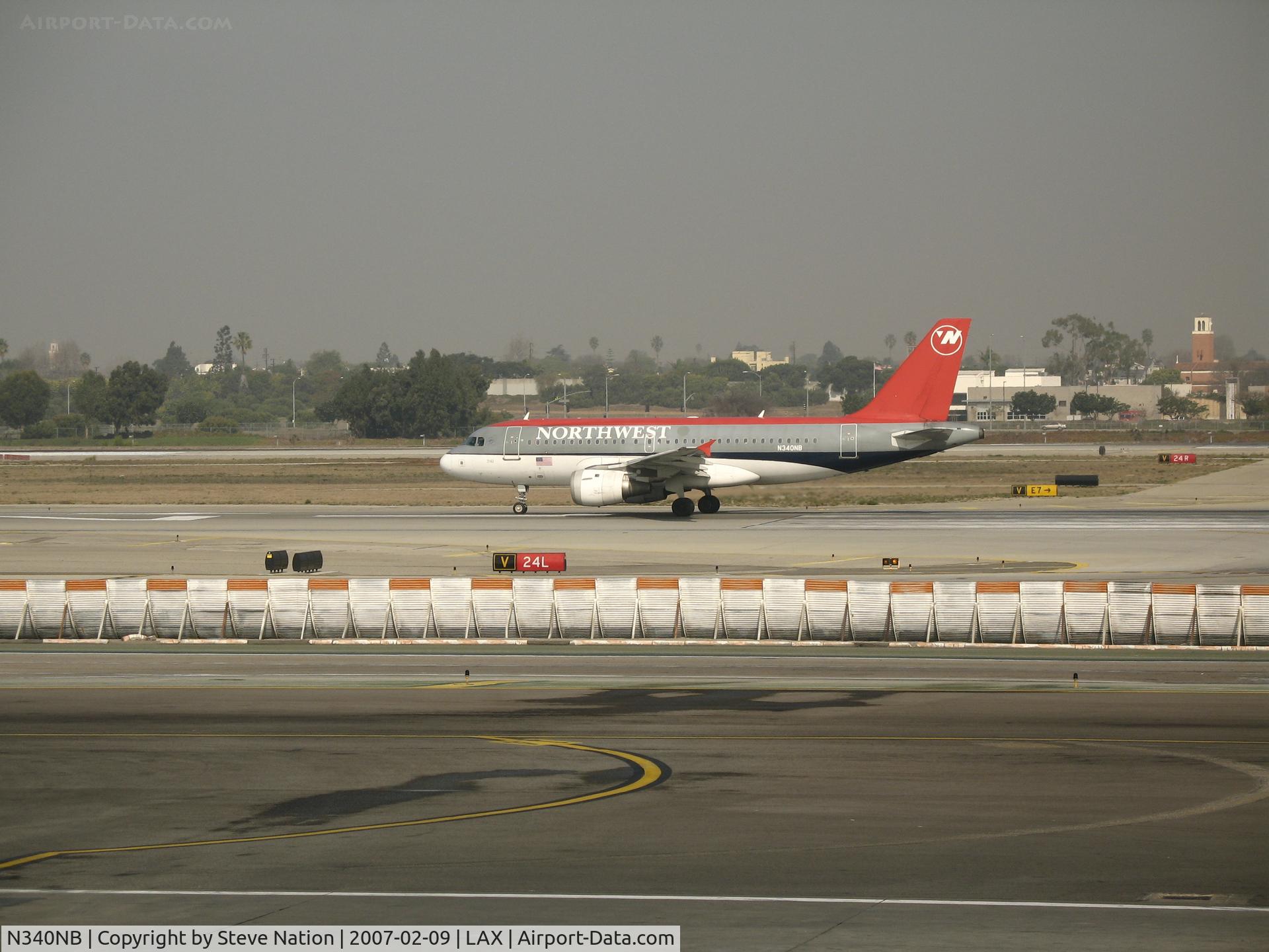 N340NB, 2002 Airbus A319-114 C/N 1714, Northwest A319-114 rolling @ LAX
