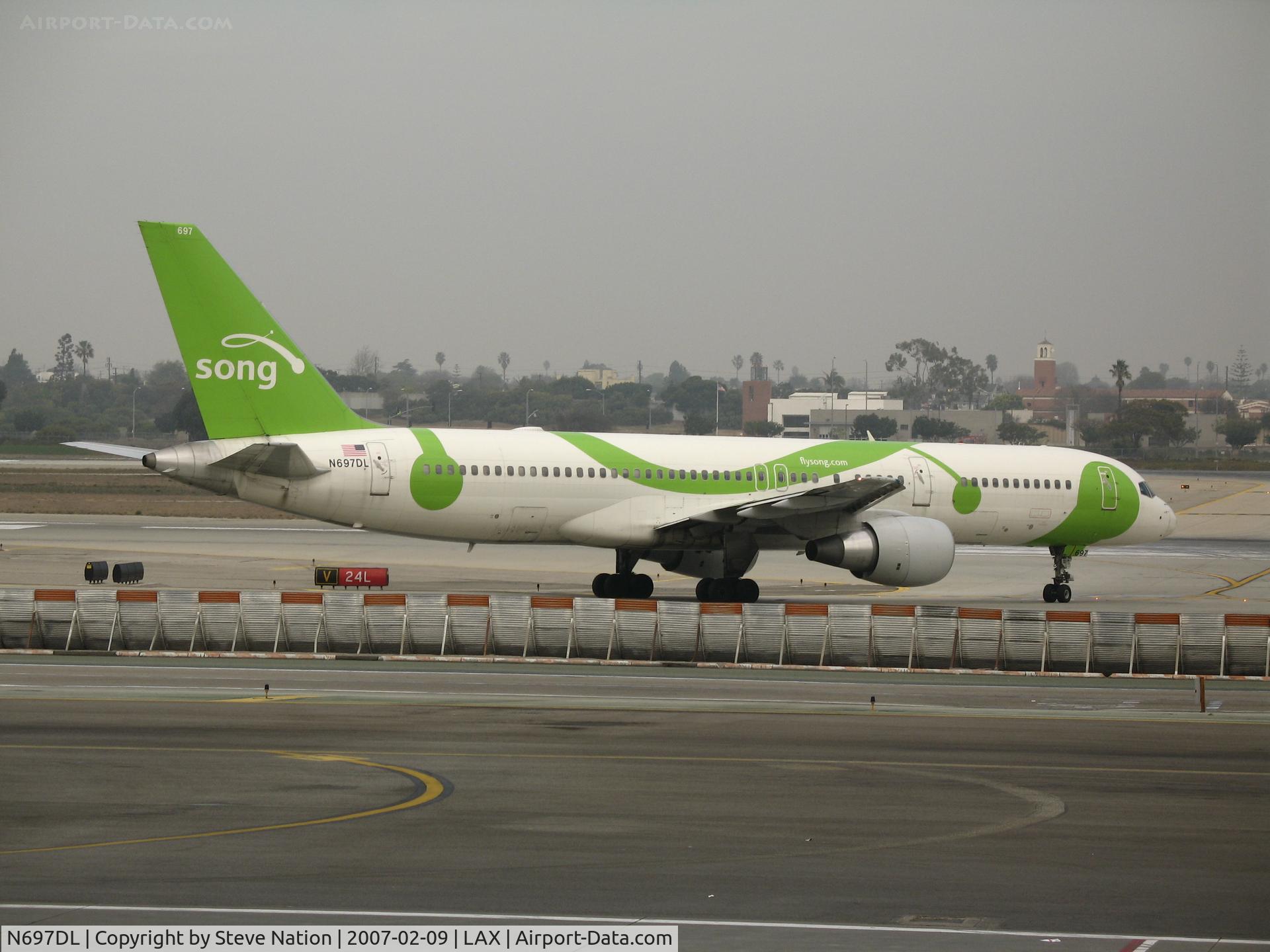 N697DL, 1999 Boeing 757-232 C/N 30318, Song 757-232 turning onto active runway @ LAX