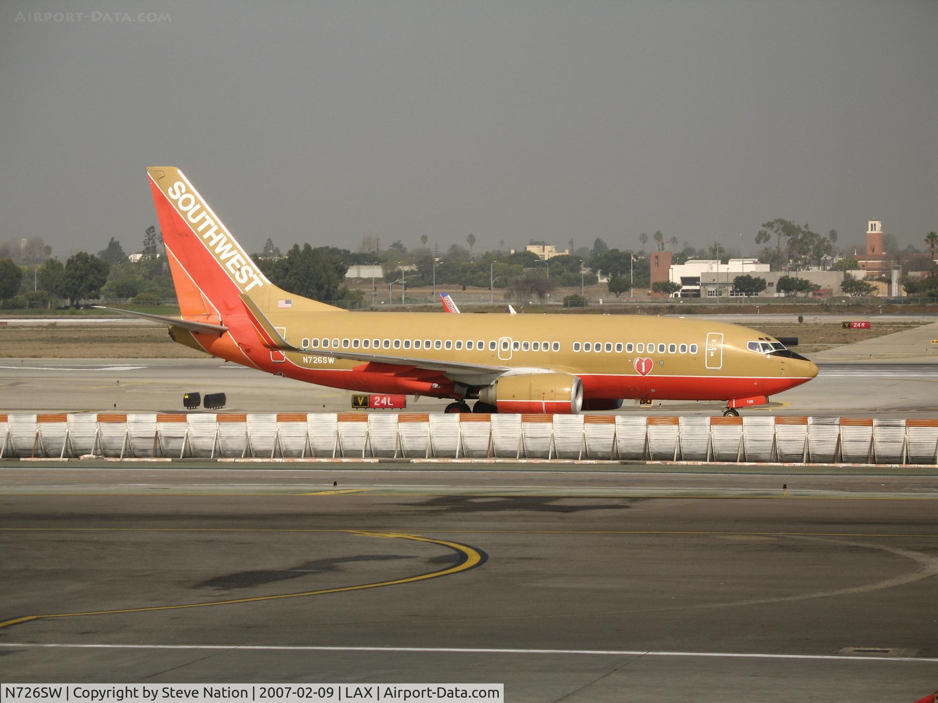 N726SW, 1999 Boeing 737-7H4 C/N 27858, Southwest 737-7H4 in old colors and winglets taxying @ LAX