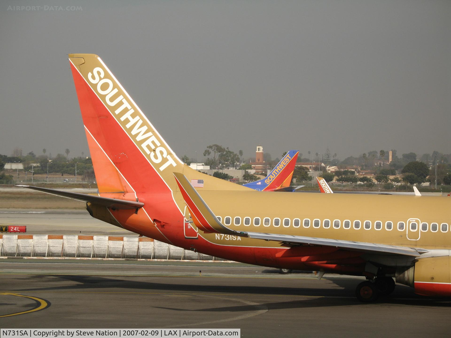 N731SA, 1999 Boeing 737-7H4 C/N 27863, Southwest 737-7H4 in old colors (close up of winglets)  @ LAX