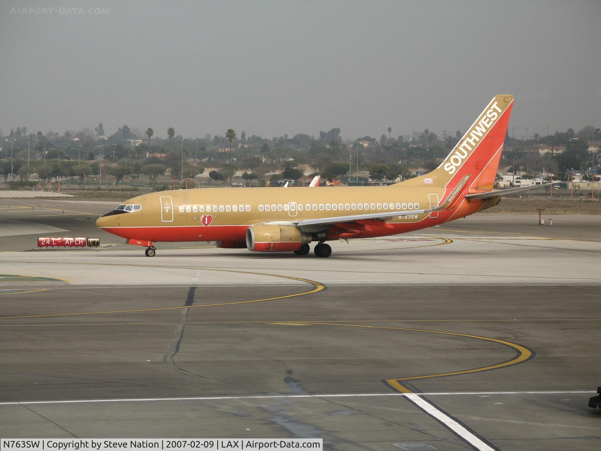 N763SW, 2000 Boeing 737-7H4 C/N 27877, Southwest 737-7H4 in old colors with winglets taxying @ LAX