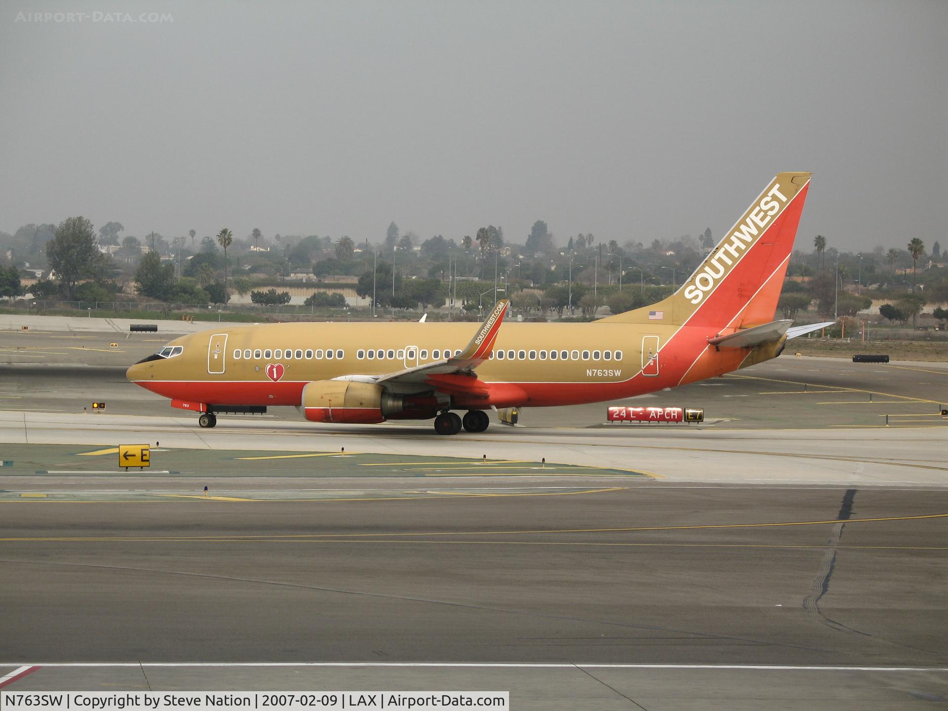 N763SW, 2000 Boeing 737-7H4 C/N 27877, Southwest 737-7H4 in old colors with winglets taxying @ LAX