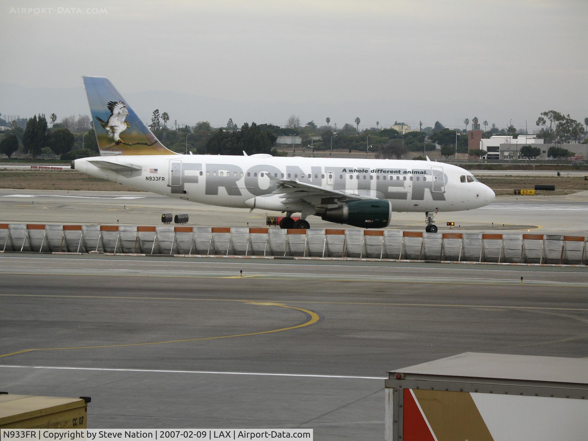 N933FR, 2004 Airbus A319-111 C/N 2260, Frontier A319-111 with Eagle on tail turning onto active runway @ LAX