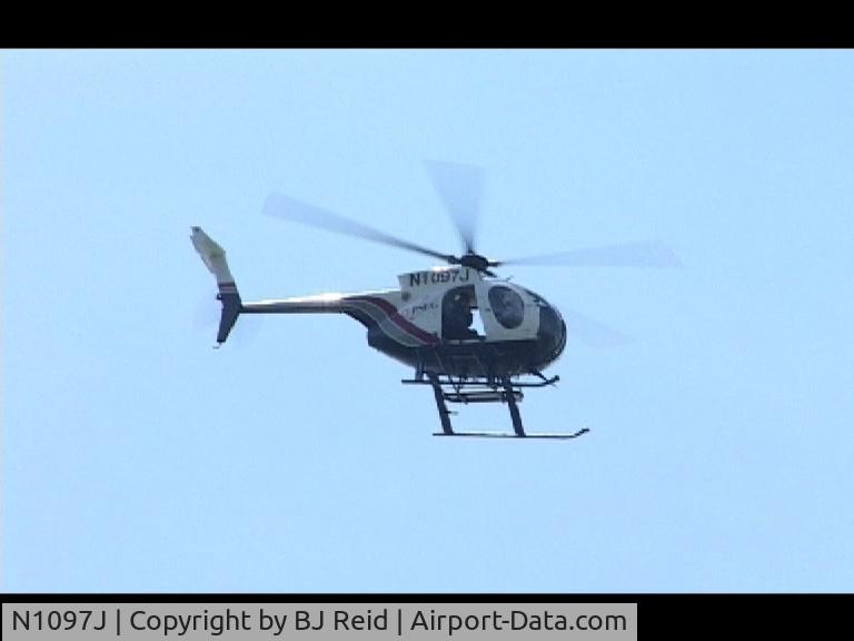 N1097J, 1980 Hughes 369D C/N 900801D, taken in NYC as it flew over harbour area in 2005