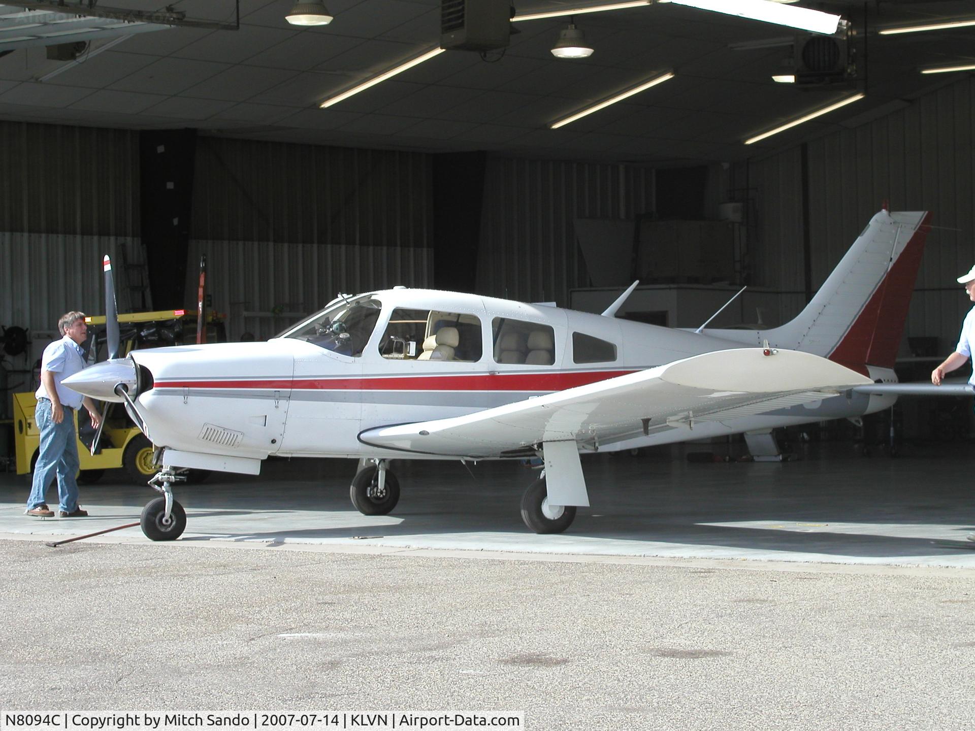 N8094C, 1975 Piper PA-28R-200 C/N 28R-7635130, Piper Arrow getting pushed inside the maintenance hangar after a flight from Grand Marais (CKC).