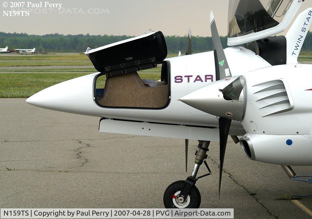 N159TS, 2006 Diamond DA-42 Twin Star C/N 42.138, Close up of the forward baggage compartment, with nosewheel well.