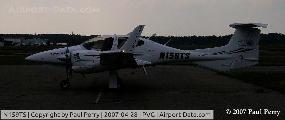 N159TS, 2006 Diamond DA-42 Twin Star C/N 42.138, Getting dark with intermittent clouds, but shows off the lights nicely