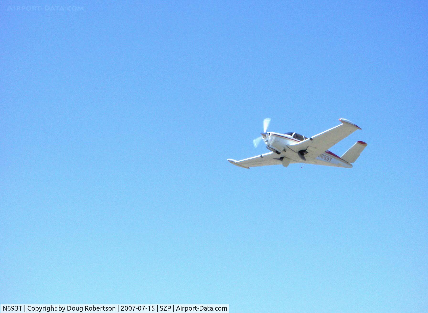 N693T, 1959 Beech K35 Bonanza C/N D-5984, 1959 Beech K35 BONANZA, Continental IO-470-C 250 Hp, 1st Bonanza with 50 gals. std., max speed 210 mph, tip tanks 15 extra gallons each, takeoff climb Rwy 22-gear doors coming up