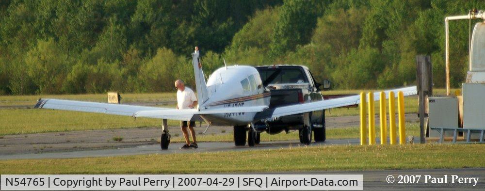 N54765, 1974 Beech C23 Sundowner 180 C/N M-1554, Topping off the tanks