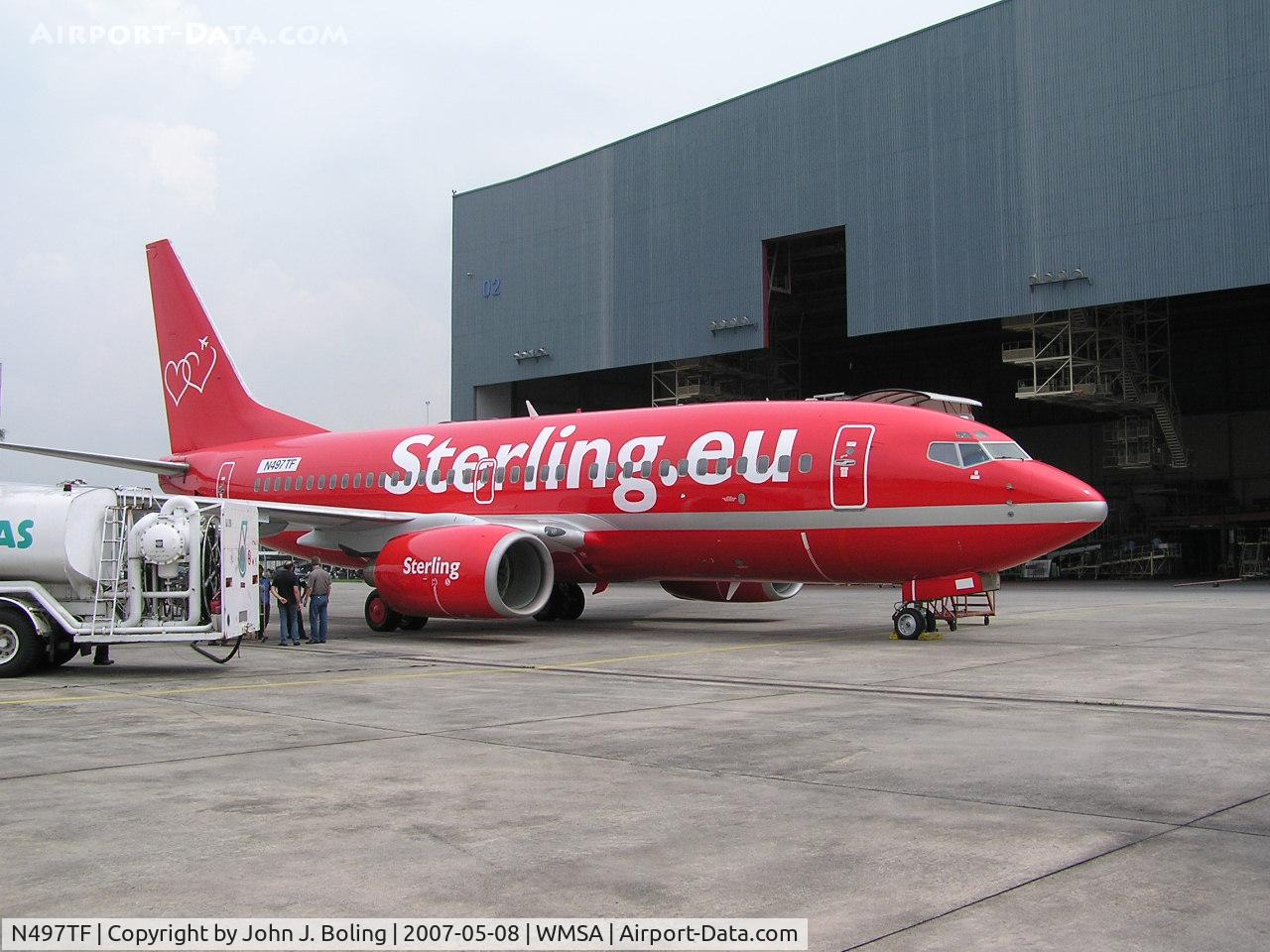 N497TF, 1999 Boeing 737-73A C/N 28497, Fueling for ferry from Kuala Lumpur to Copenhagen.