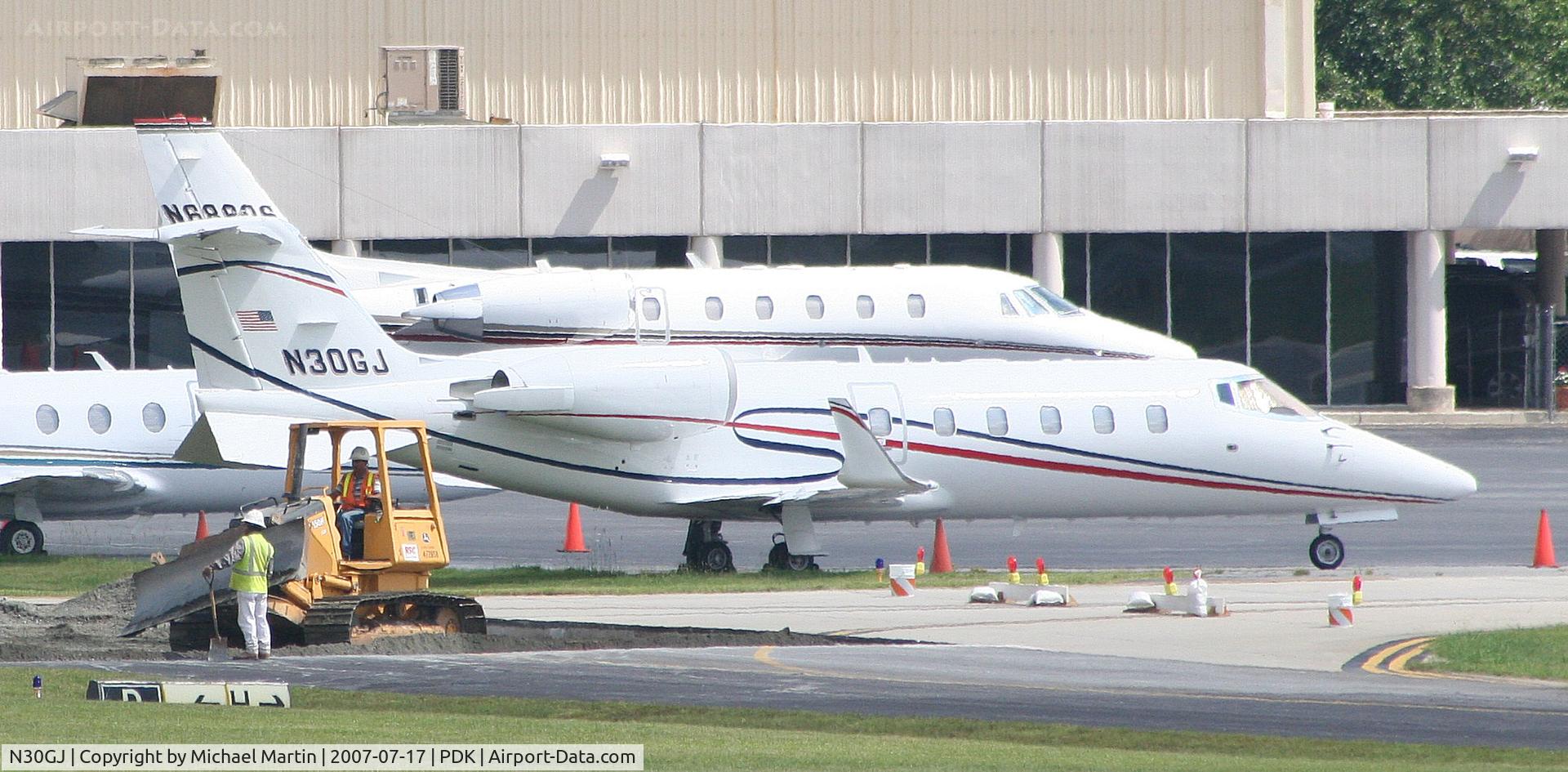 N30GJ, 2012 Learjet 60 C/N 204, New Paint - Tied down at Signature Flight Services