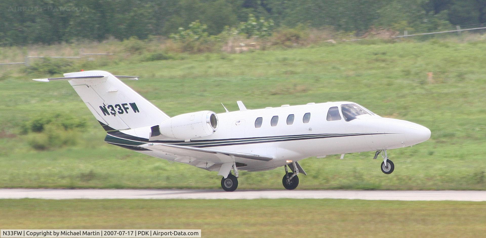 N33FW, 1997 Cessna 525 CitationJet CJ1 C/N 525-0203, Taking off from Runway 20L