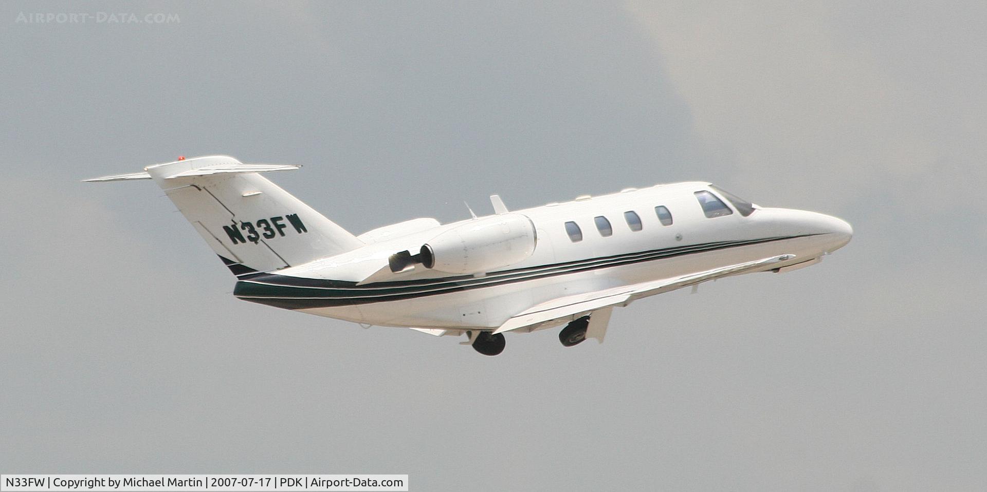 N33FW, 1997 Cessna 525 CitationJet CJ1 C/N 525-0203, Departing PDK enroute to IND