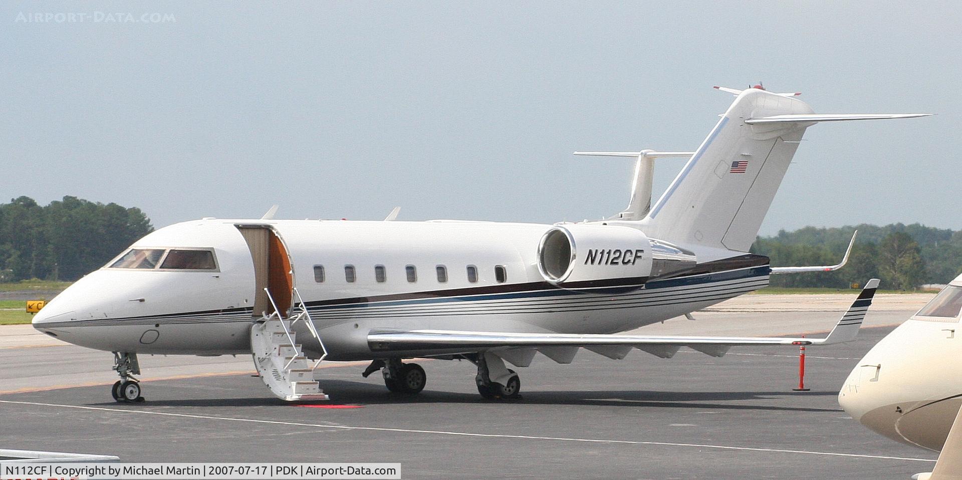 N112CF, 2001 Bombardier Challenger 604 (CL-600-2B16) C/N 5509, Tied down @ Mercury Air Center
