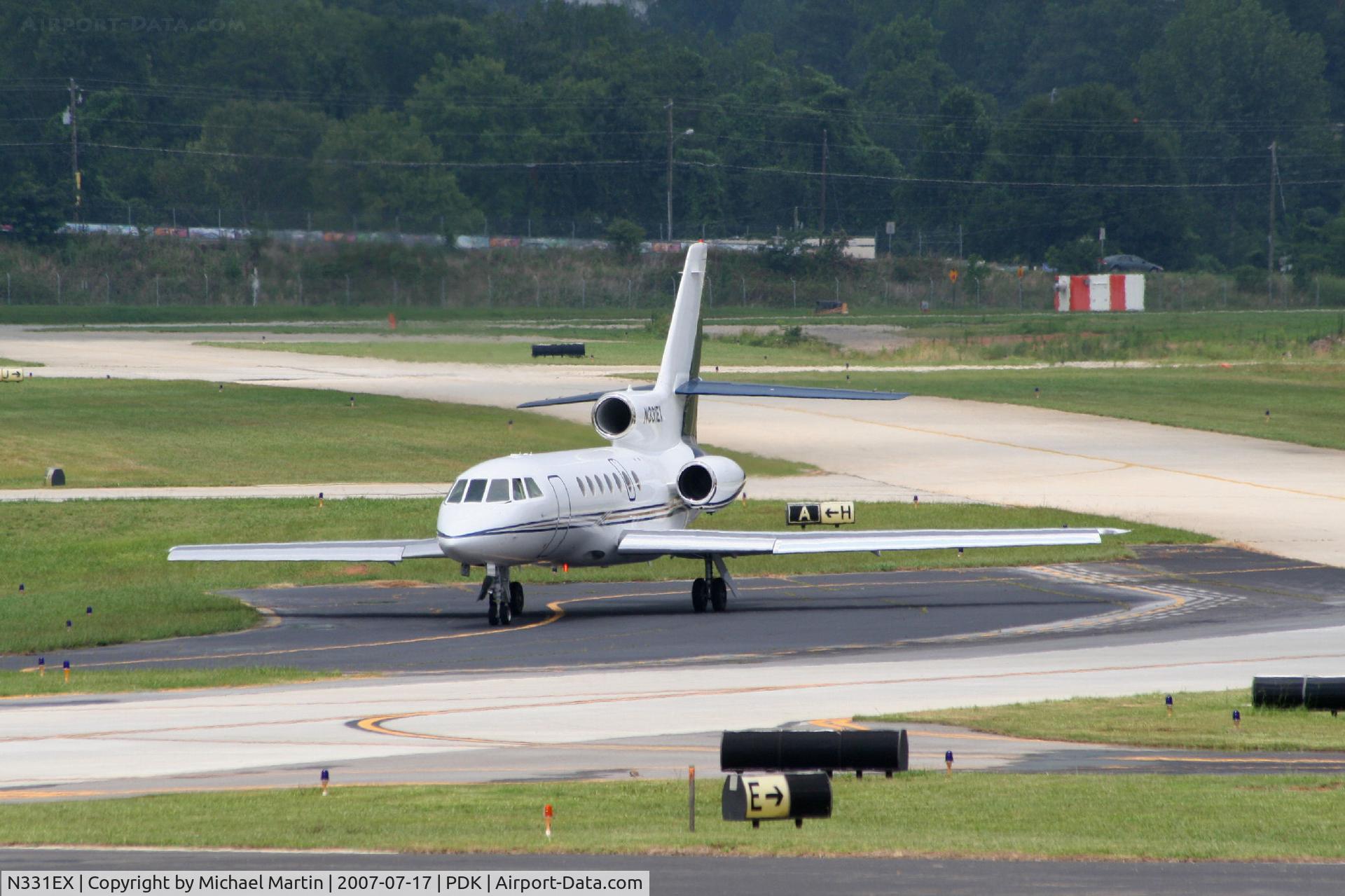 N331EX, 2003 Dassault Falcon 50 C/N 331, In Run-Up Area.  Checking the mags???