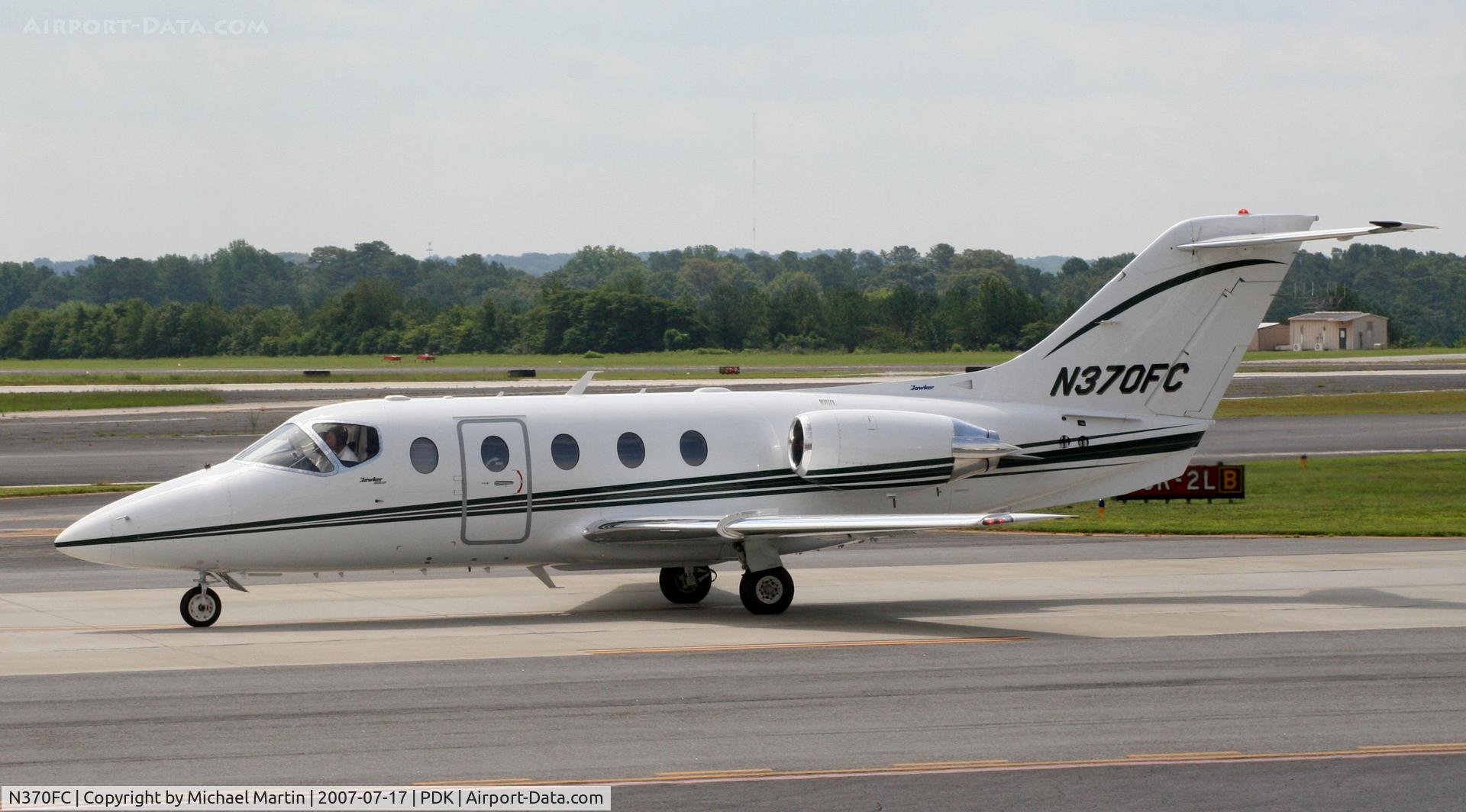 N370FC, 2004 Raytheon Aircraft Company 400A C/N RK-378, Taxing to Epps Air Service