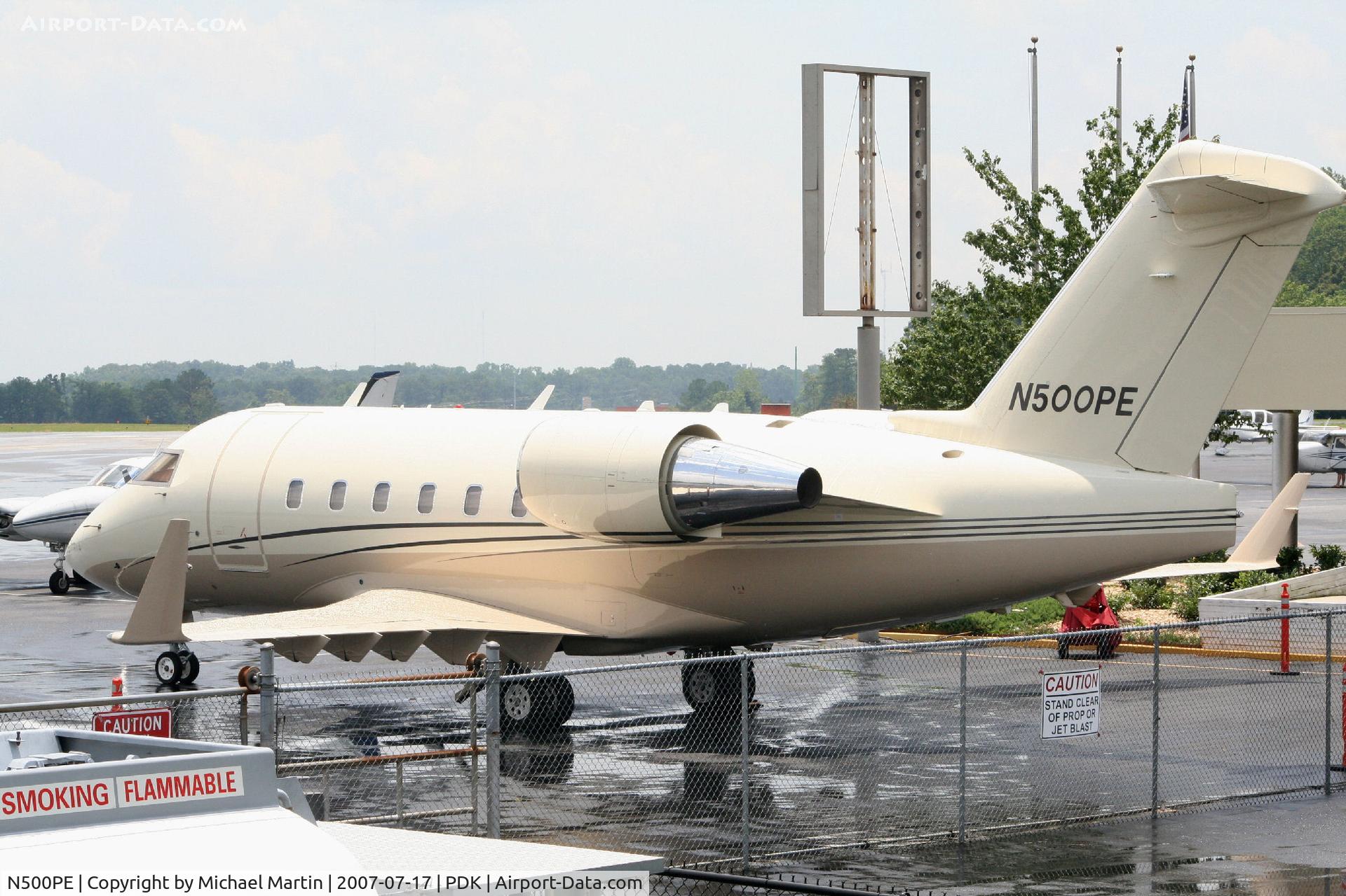 N500PE, 1999 Bombardier Challenger 604 (CL-600-2B16) C/N 5440, Tied down @ Mercury Air Center