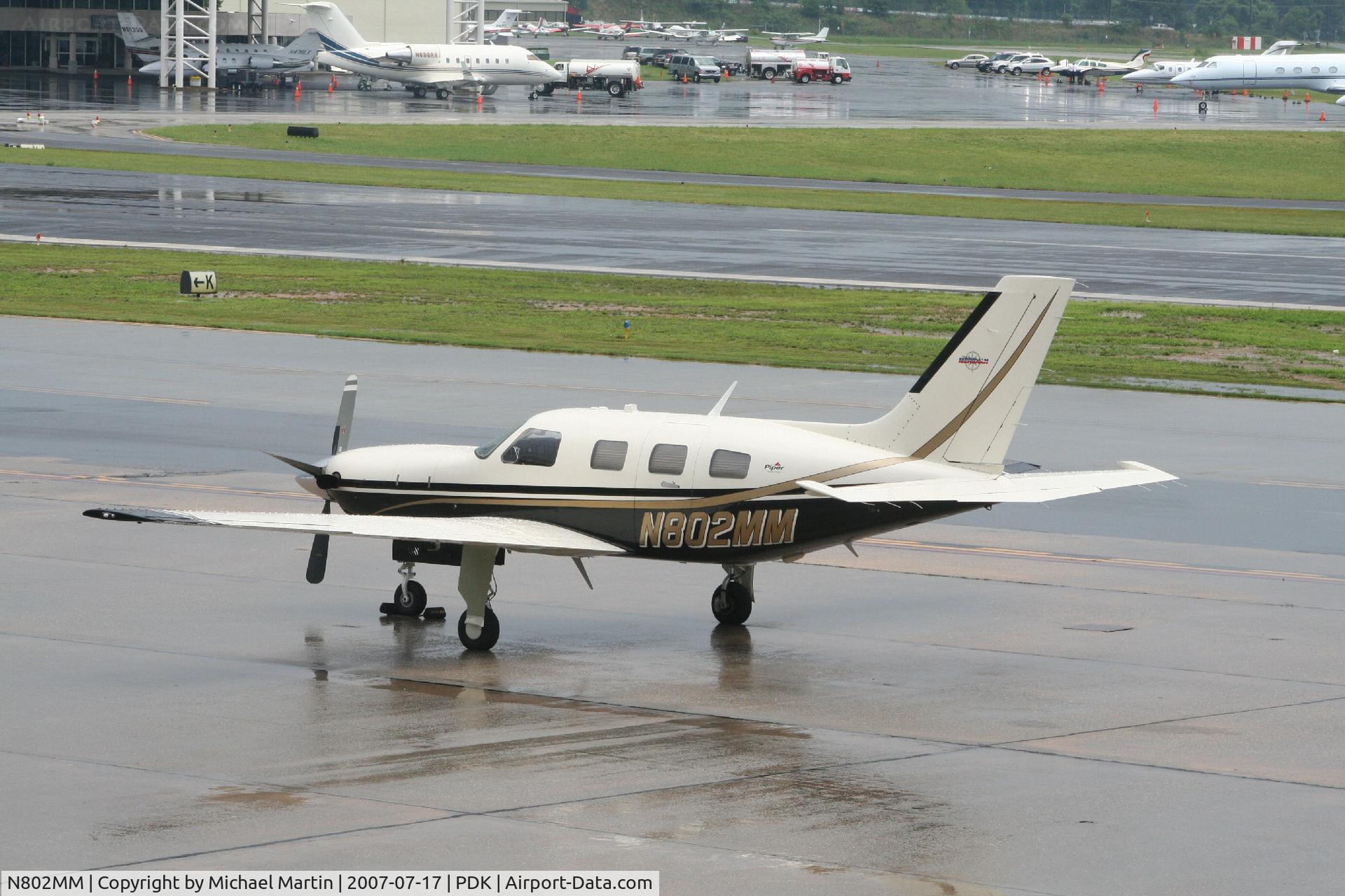 N802MM, 2002 Piper PA-46-500TP Malibu Meridian C/N 4697148, At Epps Air Service In The Rain