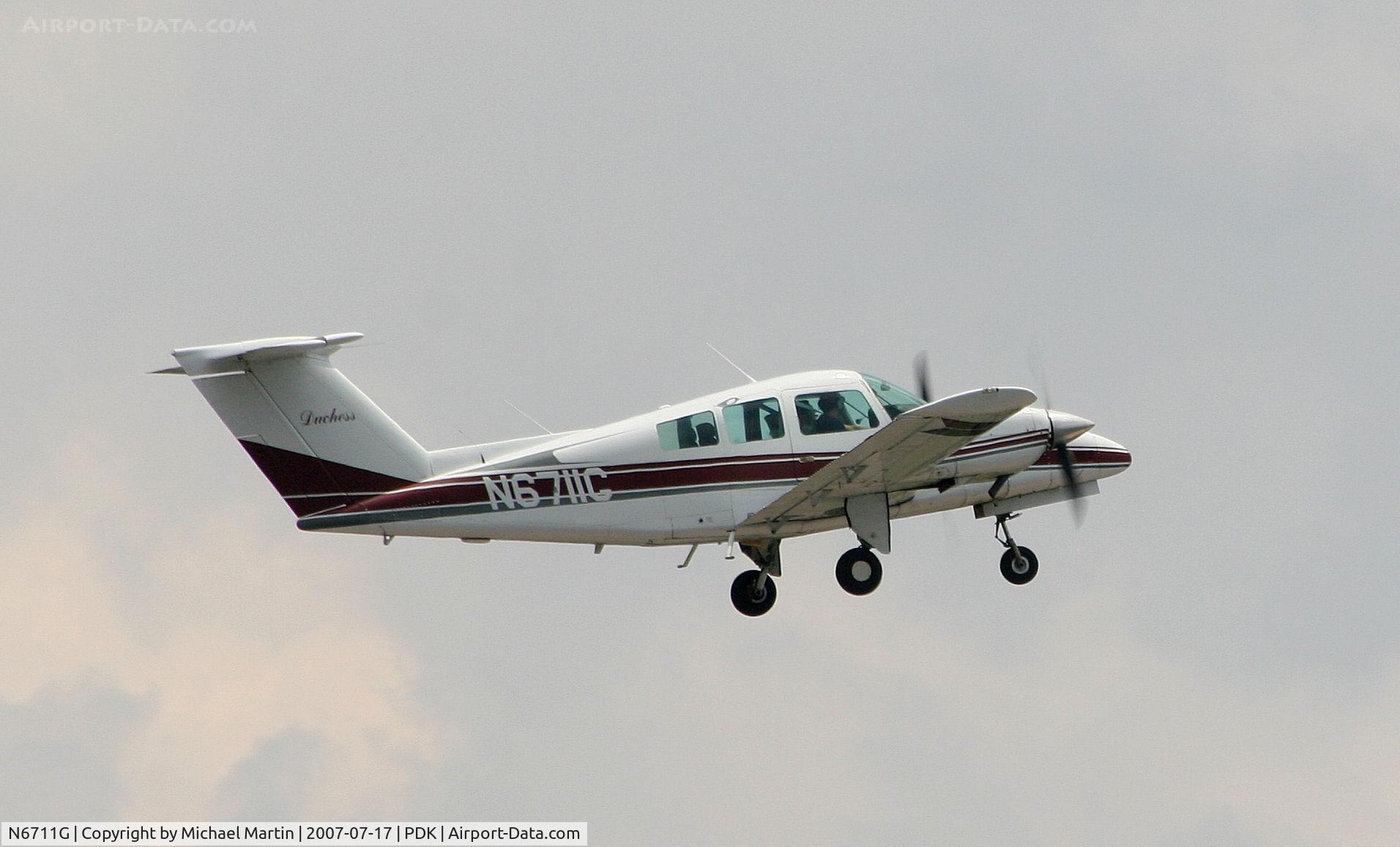 N6711G, 1979 Beech 76 Duchess C/N ME-311, Departing PDK enroute to AUO