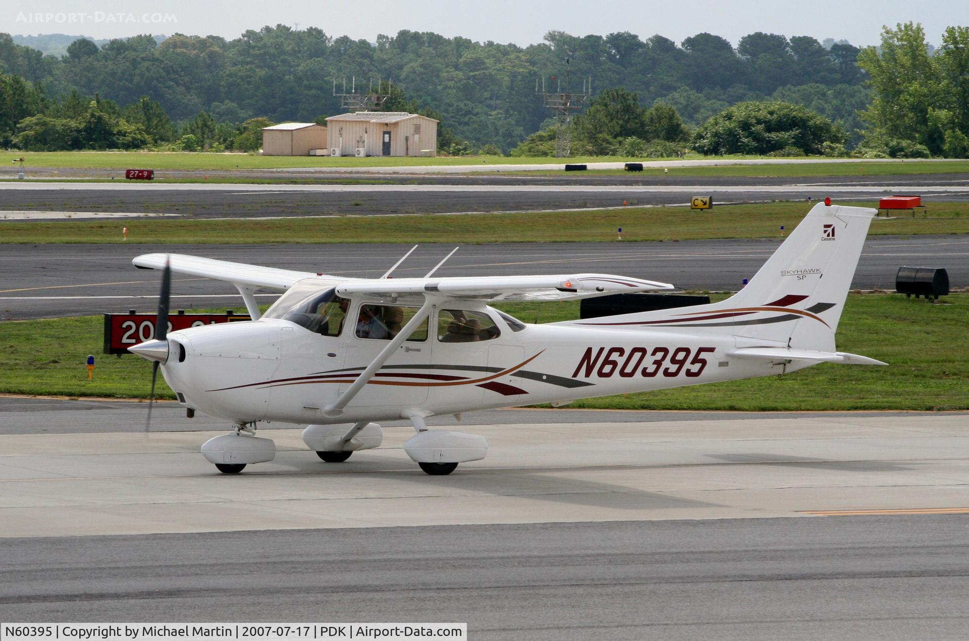 N60395, 2006 Cessna 172S Skyhawk SP C/N 172S10226, Taxing to Epps Air Service